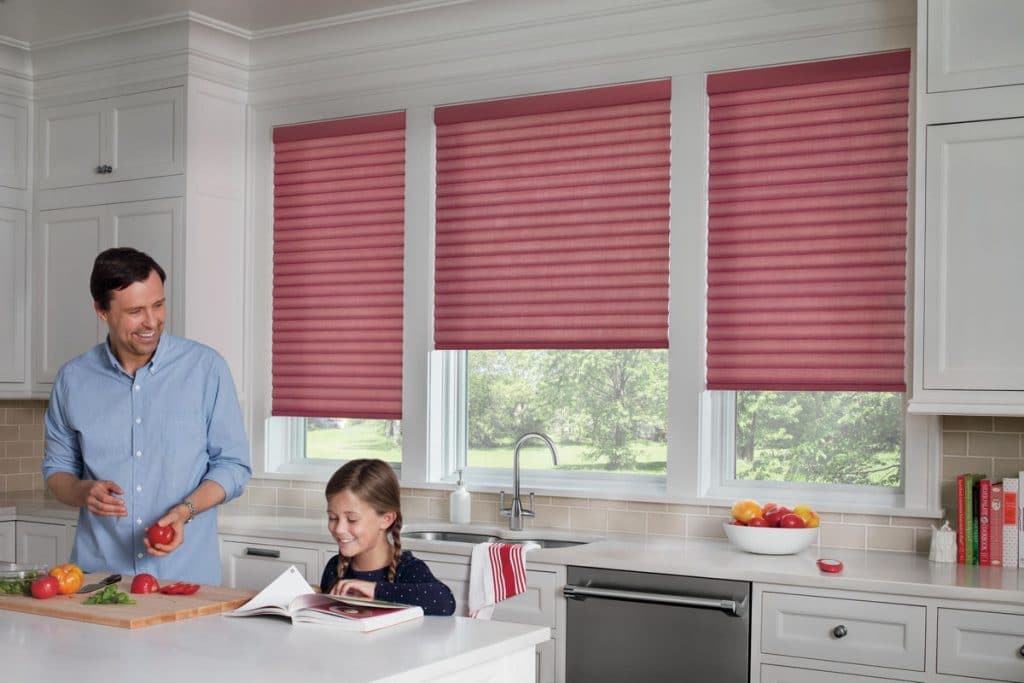 Family enjoying cooking together with Sonnette blinds.